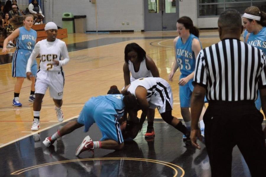 Centurion players scramble for the ball during the season opener against Philadelphia CC