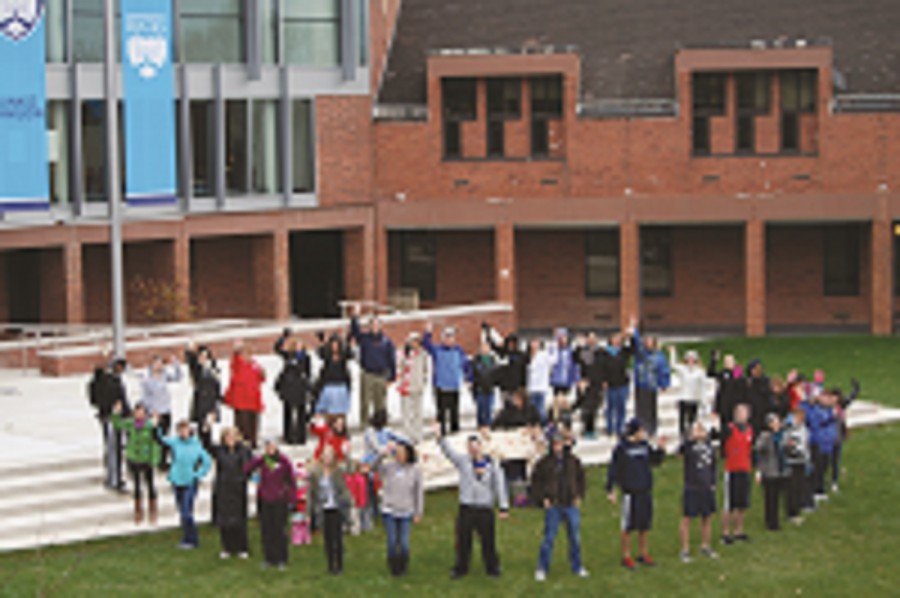 Participants in the Walk for diabetes forming the world logo for diabetes day on the campus square.
