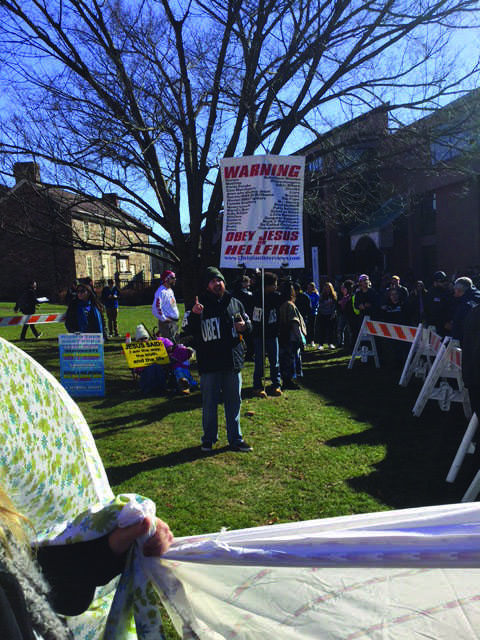 Protesters Return to Newtown Campus